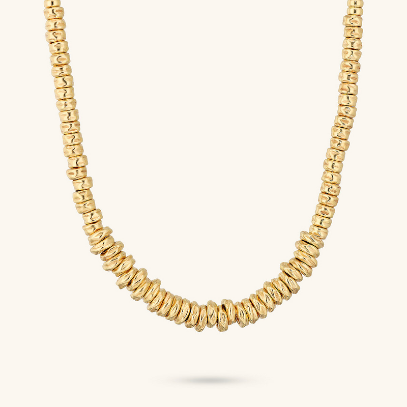 Necklace with Hammered Rondelles and Shiny Spheres