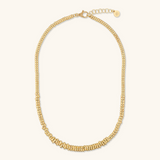 Necklace with Hammered Rondelles and Shiny Spheres