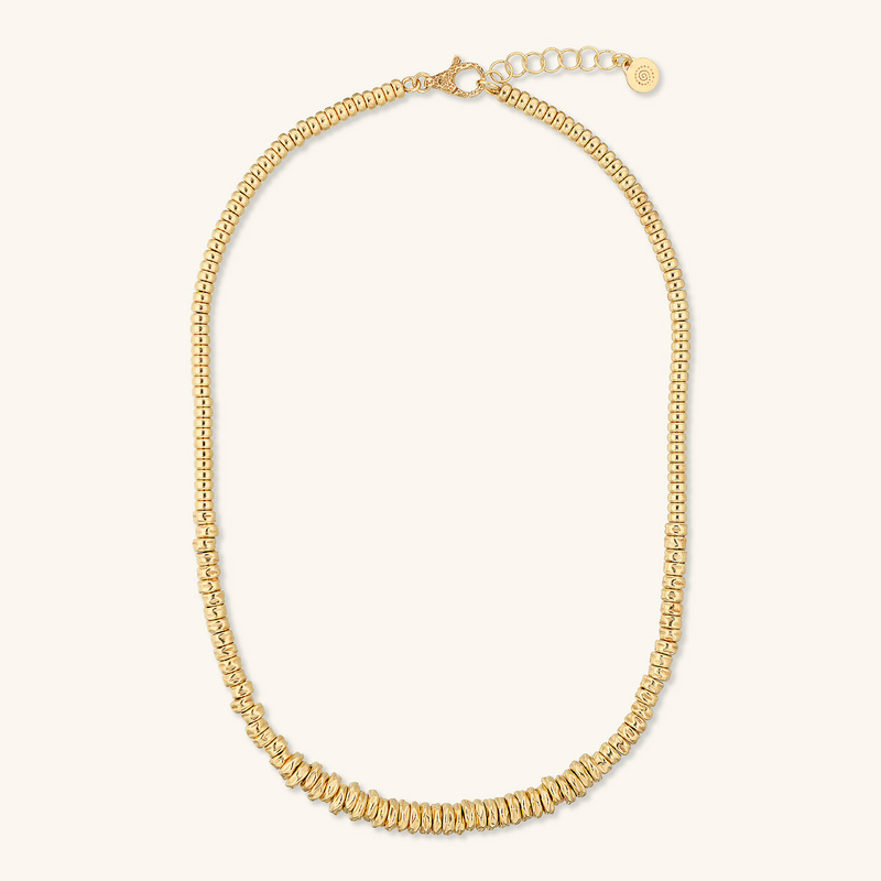 Necklace with Hammered Rondelles and Shiny Spheres